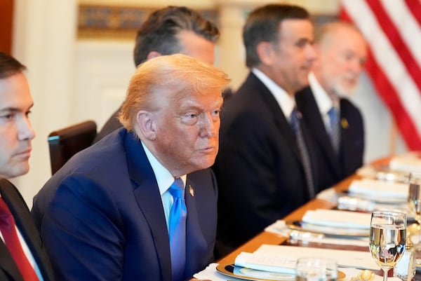 Secretary of State Marco Rubio, from left, President Donald Trump, Defense Secretary Pete Hegseth, obstructed, CIA Director John Ratcliffe and U.S. Ambassador to Israel Mike Huckabee listen during a meeting with Israel's Prime Minister Benjamin Netanyahu in the Blue Room of the White House, Monday, July 7, 2025, in Washington. (AP Photo/Alex Brandon)