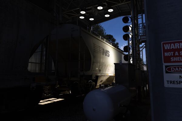 A Norfolk Southern train passes through a digital train inspection portal in Jackson on March 7. Arvin Temkar/AJC