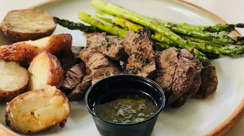 Mediterranea’s steak-frites comes with roasted potatoes, asparagus and chimichurri. CONTRIBUTED BY WENDELL BROCK