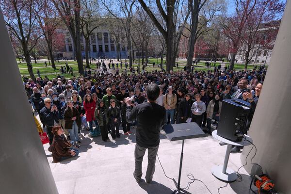 Archon Fung, professor at the John F. Kennedy School of Government, addresses students, faculty and members of the Harvard University community rally, Thursday, April 17, 2025, in Cambridge, Mass. (AP Photo/Charles Krupa)
