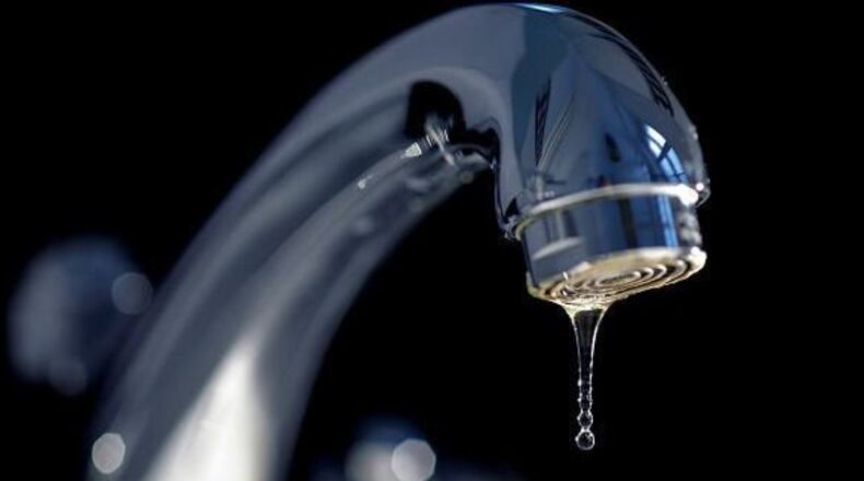 Cobb County will increase water fees, citing increasing costs for water and other materials. FILE