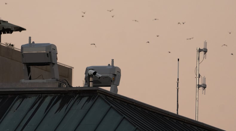 Drones stations are pictured on a federal building near the White House,Wednesday, Sept. 16, 2026, in Washington. (AP Photo/Allison Robbert)