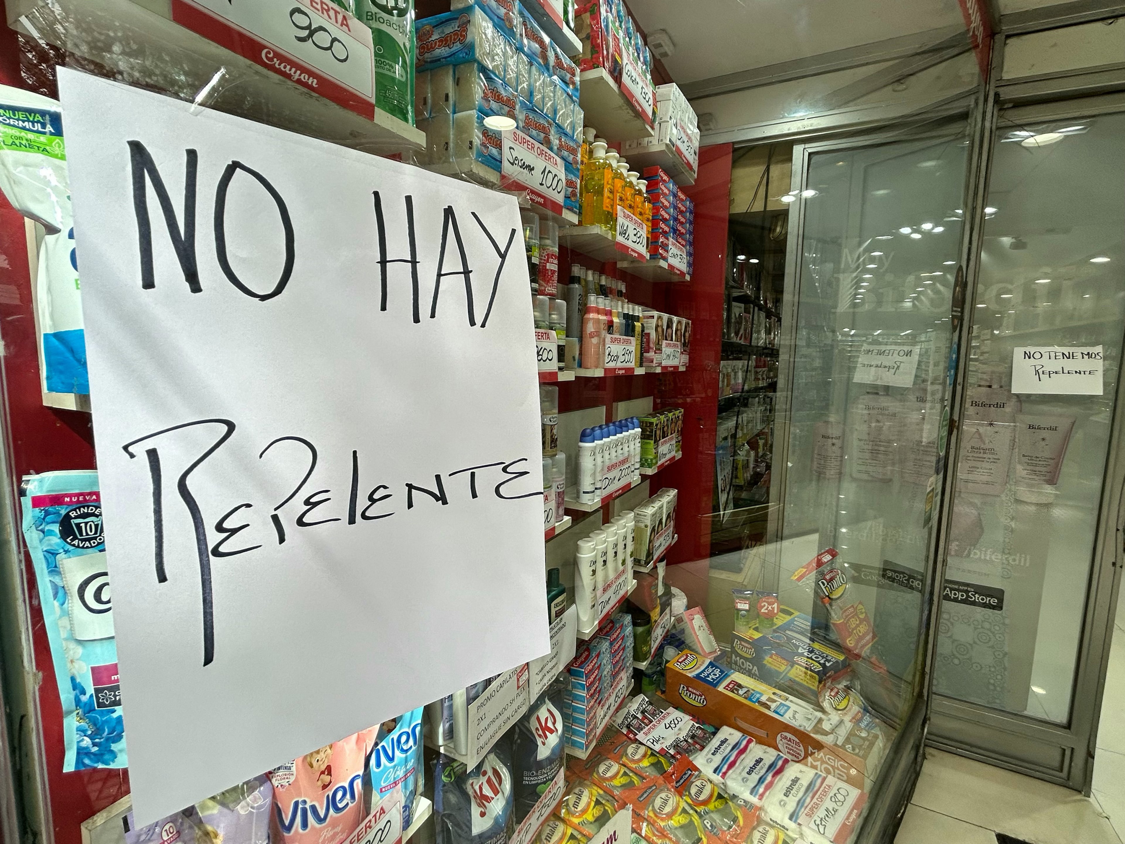 A sign reading "No Repellent Available" is displayed on the window of a store in Buenos Aires on April 2, 2024. (Juan Mabromata/Getty Images)