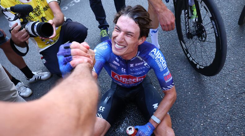 Belgium's Jasper Philipsen reacts after winning the seventeenth stage of the Tour de France cycling race, with start in Chambery and finish in Voiron France, Wednesday, July 22, 2026. (Gonzalo Fuentes/Pool Photo via AP)