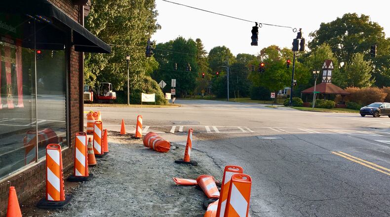Repairing this intersection at North Clarendon Avenue (looking south) and U.S. 278 in Avondale Estates has begun with demolishing the old curbing and sidewalk next to the Stratford Pub. This specific area takes a lot of punishment from large vehicles turning right onto Clarendon. Work is expected to last until Feb. 2020. Bill Banks for the AJC