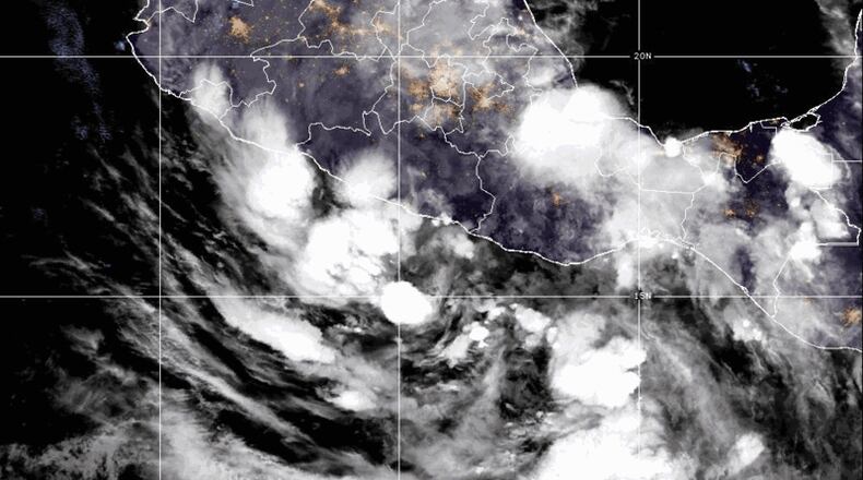 This satellite image provided by CIRA/NOAA, shows Tropical Storm Boris forming just off the coast of Guerrero Mexico, on Monday, June 8, 2026. (CIRA/NOAA via AP)