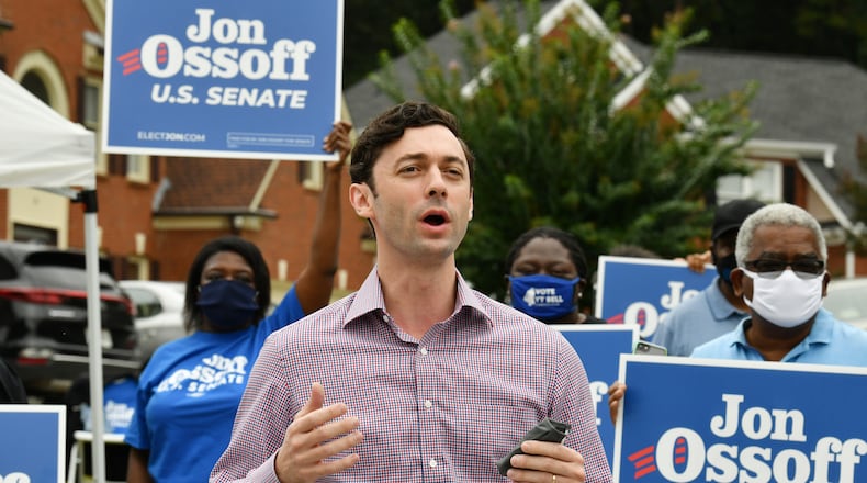 September 26, 2020 Stone Mountain - U.S. Senate candidate Jon Ossoff speaks to his supporters prior to a drive-thru, socially distanced, yard-sign pickup event hosted by the Georgia Federation of Democratic Women and the DeKalb Democratic Women’s groups in Stone Mountain on Saturday, September 26, 2020. Hyosub Shin / Hyosub.Shin@ajc.com)