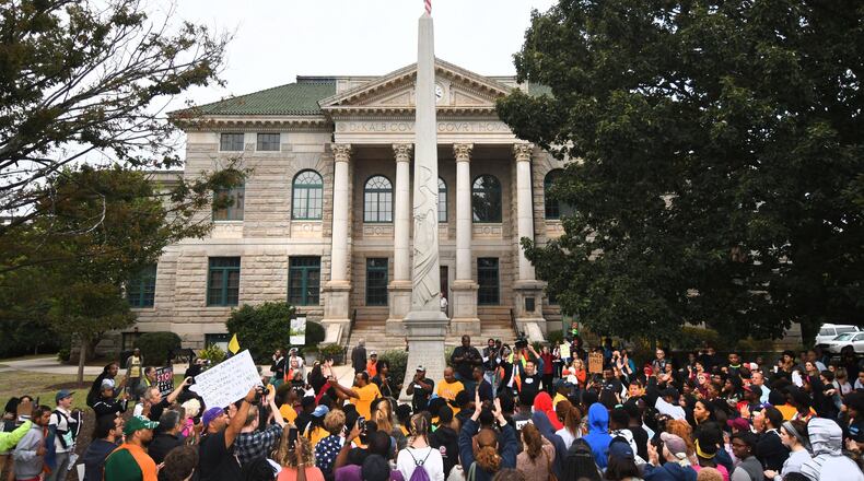 Protesters rally against the Confederate monument in Decatur Square in September. Hate Free Decatur organized a march and rally entitled “Nothing Great About Hate: Remove the Symbol to White Supremacy.” File photo. (Rebecca Breyer for The AJC)