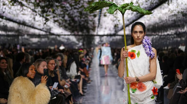 A model wears a creation as part of the Christian Dior Spring/Summer 2026 Haute Couture collection presented in Paris, Monday, Jan. 26, 2026. (AP Photo/Aurelien Morissard)