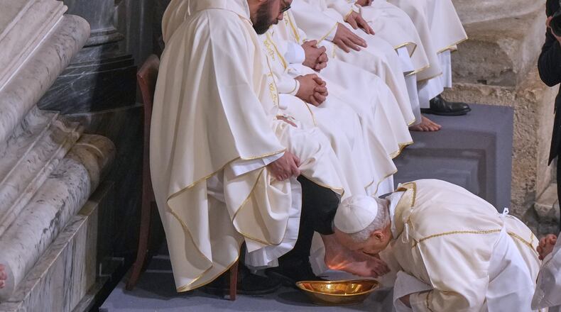 Pope Leo XIV washes and kisses the feet of 12 Roman priests during the Missa in Caena Domini, the Mass of the Lord's Supper, on Catholic Holy Thursday in St. John Lateran Basilica in Rome, Thursday, April 2, 2026. (AP Photo/Andrew Medichini)