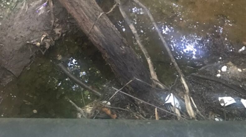 Melanie Watson wants trash cleaned out of a culvert.