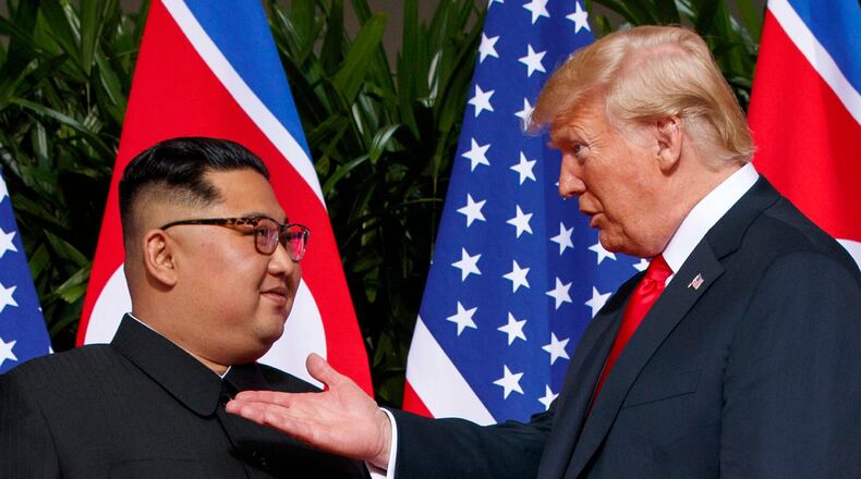 FILE - U.S. President Donald Trump, right, meets with North Korean leader Kim Jong Un on Sentosa Island in Singapore, on June 12, 2018. (AP Photo/Evan Vucci, File)