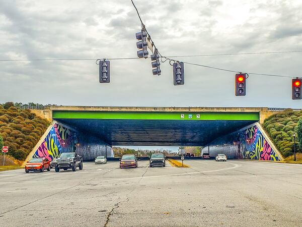 "Synchronicity" by Krista Jones (a.k.a. JONESY) as seen from outside the Sugarloaf Parkway/I-85 underpass.
(Arthur Rudick)