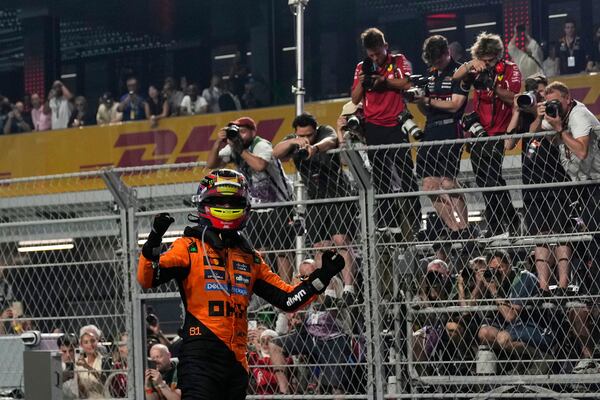 McLaren driver Oscar Piastri of Australia celebrates after winning the Formula One Saudi Arabian Grand Prix at the Jeddah Corniche Circuit in Jeddah, Saudi Arabia, Sunday, April 20, 2025. (AP Photo/Altaf Qadri)