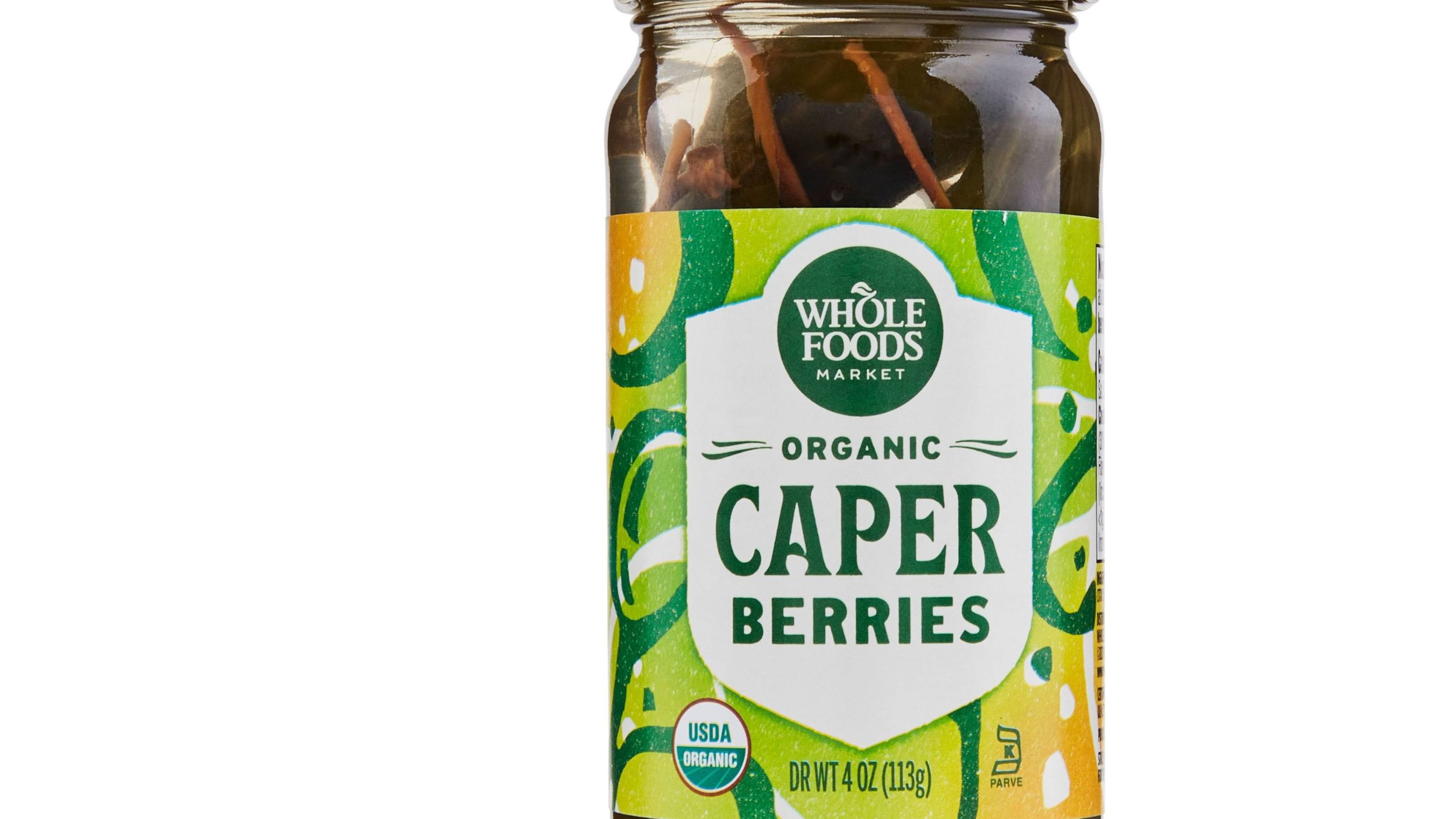 Whole Foods caper berries come packed in water, vinegar and salt.