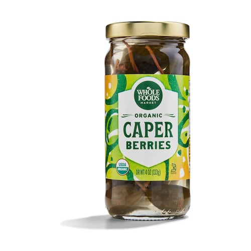 Whole Foods caper berries come packed in water, vinegar and salt.