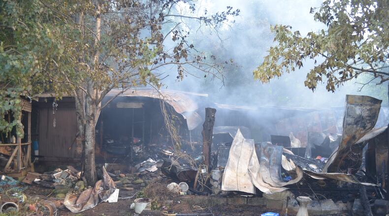 Adam Rogers, 58, and several of his dogs were killed in a mobile home fire early Friday morning. Two other people were injured trying to rescue Rogers from the blaze.