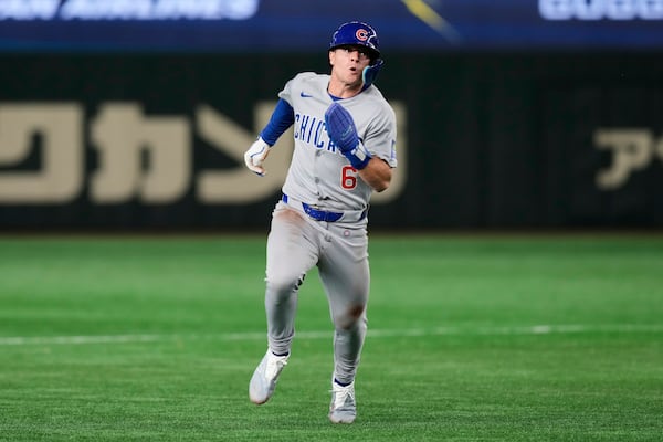 Chicago Cubs' Matt Shaw rounds third on his way home to score on a Dansby Swanson double in the fifth inning of an MLB Tokyo Series baseball game against the Los Angeles Dodgers in Tokyo, Japan, Wednesday, March 19, 2025. (AP Photo/Eugene Hoshiko)