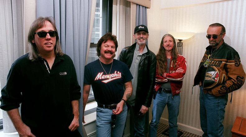 The 2000 version of the Doobie Brothers. From left are John McFee, Tom Johnston, Keith Knudsen, Patrick Simmons and Michael Hossack. AP file/Jim Cooper