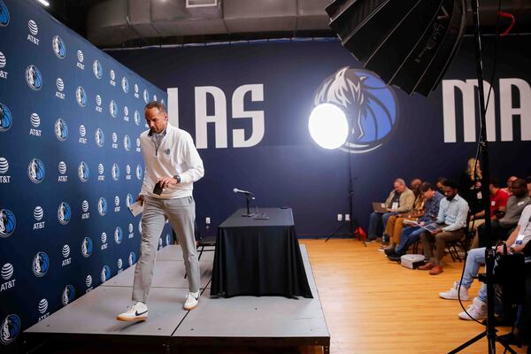 Mavericks GM Nico Harrison leaves the podium after speaking during a press conference at the Mavericks Training Center in Dallas, Texas, Monday, April 21, 2025. (Juan Figueroa /The Dallas Morning News via AP)