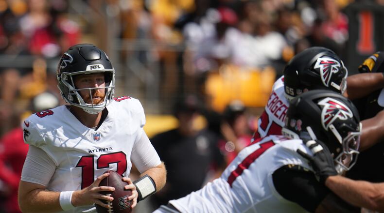 Atlanta Falcons quarterback Cooper Rush (13) looks to pass the ball during an NFL football game against the against the Pittsburgh Steelers, Sunday, Sept. 13, 2026, in Pittsburgh. (AP Photo/Gene J. Puskar)