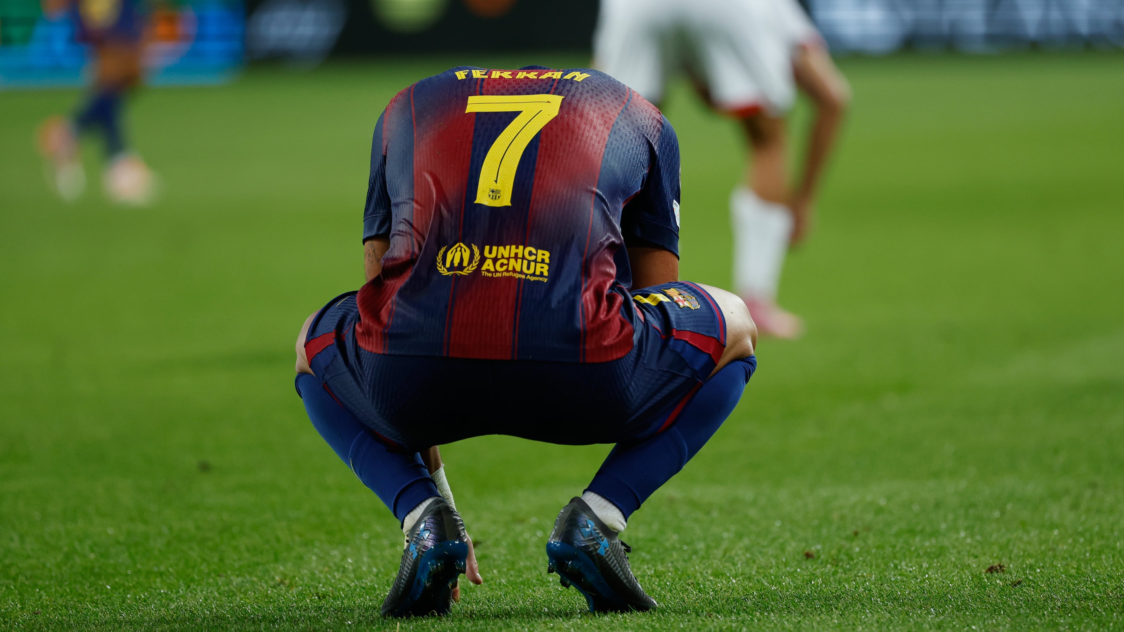 Barcelona's Ferran Torres, reacts at the end of the Champions League opening phase soccer match between Barcelona and Paris Saint-Germain at the Lluis Companys Olympic Stadium in Barcelona, Spain, Wednesday, Oct. 1, 2025. (AP Photo/Joan Monfort)