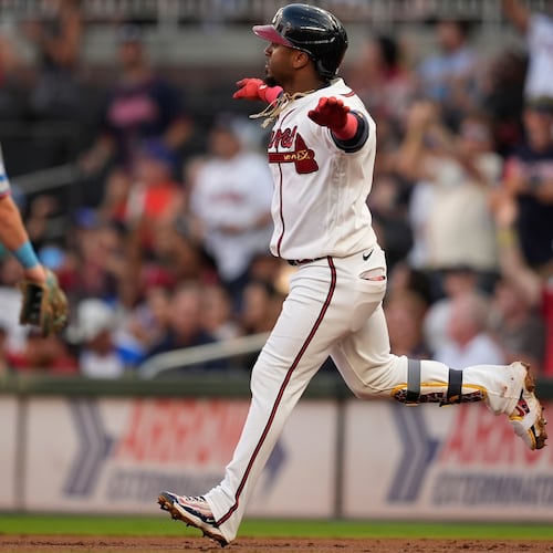 Atlanta Braves' Ozzie Albies (1) celebrates his solo homerun in the second inning of a baseball game against the Miami Marlins, Tuesday, Aug. 4, 2026, in Atlanta. (AP Photo/Mike Stewart)