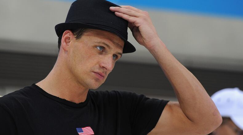 Ryan Lochte is happy these days talking about his son and fiancee.