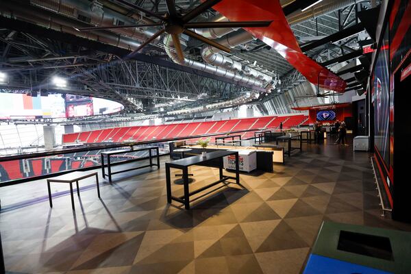 Fans attending games and concerts at Mercedes-Benz Stadium will now have access to the new Sports Illustrated lounge. The 6,000-square-foot social space features 700 cushioned seats, food and beverage options, grab-and-go stations and multiple full-service bars. (Miguel Martinez/AJC)