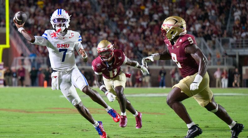 SMU quarterback Kevin Jennings (7) looks to throw during the first half of an NCAA college football game against Florida State, Monday, Sept. 7, 2026, in Tallahassee, Fla. (AP Photo/Noah Lantor)