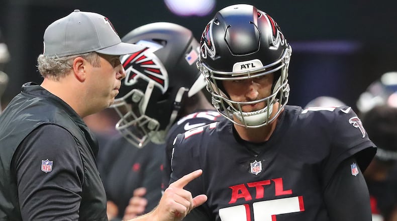 Falcons head coach Arthur Smith confers with backup quarterback Josh Rosen as they prepare to play the Cleveland Browns the final exhibition game of the preseason Sunday, Aug. 29, 2021, at Mercedes-Benz Stadium in Atlanta. (Curtis Compton / Curtis.Compton@ajc.com)