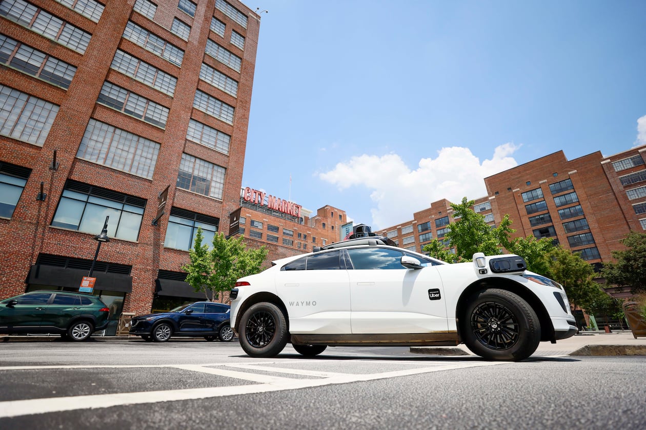 A self-driving Waymo vehicle is seen leaving Ponce City Market in Atlanta on Monday, June 23, 2025. Waymo is preparing to launch on the Uber app in Atlanta, utilizing the most advanced autonomous driving technology. (Miguel Martinez/AJC)