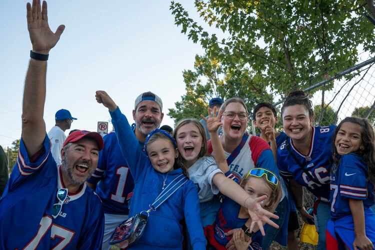 Buffalo Bills fans tailgate outside Mercedes-Benz Stadium on Monday, Oct. 13, 2025, in Atlanta, ahead of the Monday Night Football game against the Atlanta Falcons. Many traveled from New York and across the country to join the “Bills Mafia” gathering. (Olivia Bowdoin for the AJC)