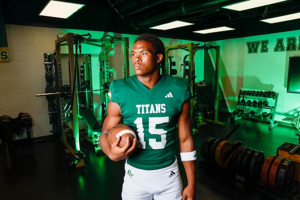 AJC Super 11 player David "DJ" Jacobs of Blessed Trinity stood for this portrait at his high school this summer. (Miguel Martinez/AJC)