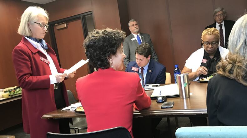 DeKalb House delegation chair Rep. Karla Drenner, left, speaks during a meeting Tuesday. TYLER ESTEP / TYLER.ESTEP@AJC.COM