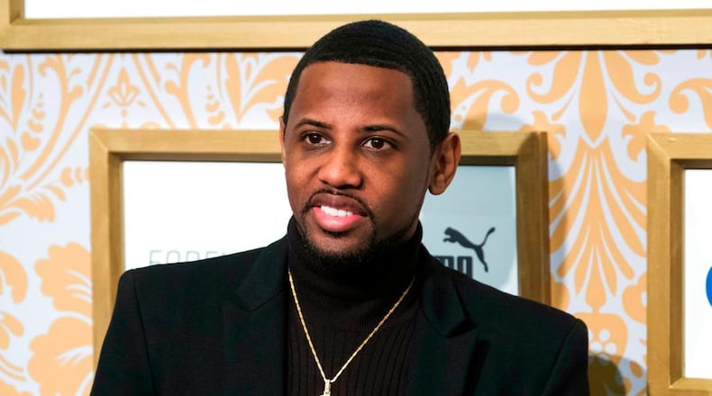 FILE - In this Jan. 27, 2018 file photo, Fabolous attends the Roc Nation pre-Grammy brunch at One World Trade Center in New York. Englewood police say the rapper, whose real name is John Jackson, turned himself in Wednesday, March 28. They say the alleged incident occurred earlier that day, but they would not identify the victim or say who reported it. He was charged with aggravated assault and making terroristic threats. He was released Wednesday night. (Photo by Charles Sykes/Invision/AP, File)