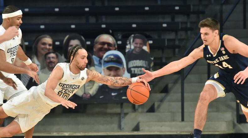 February 6, 202, 2021 Atlanta - Georgia Tech's guard Jose Alvarado (10) grab a rebound against Notre Dame's forward Nate Laszewski (14) in the second half of a NCAA college basketball game at Georgia Tech's McCamish Pavilion in Atlanta on Saturday, February 6, 2021. Georgia Tech won 82-80 over Notre Dame. (Hyosub Shin / Hyosub.Shin@ajc.com)