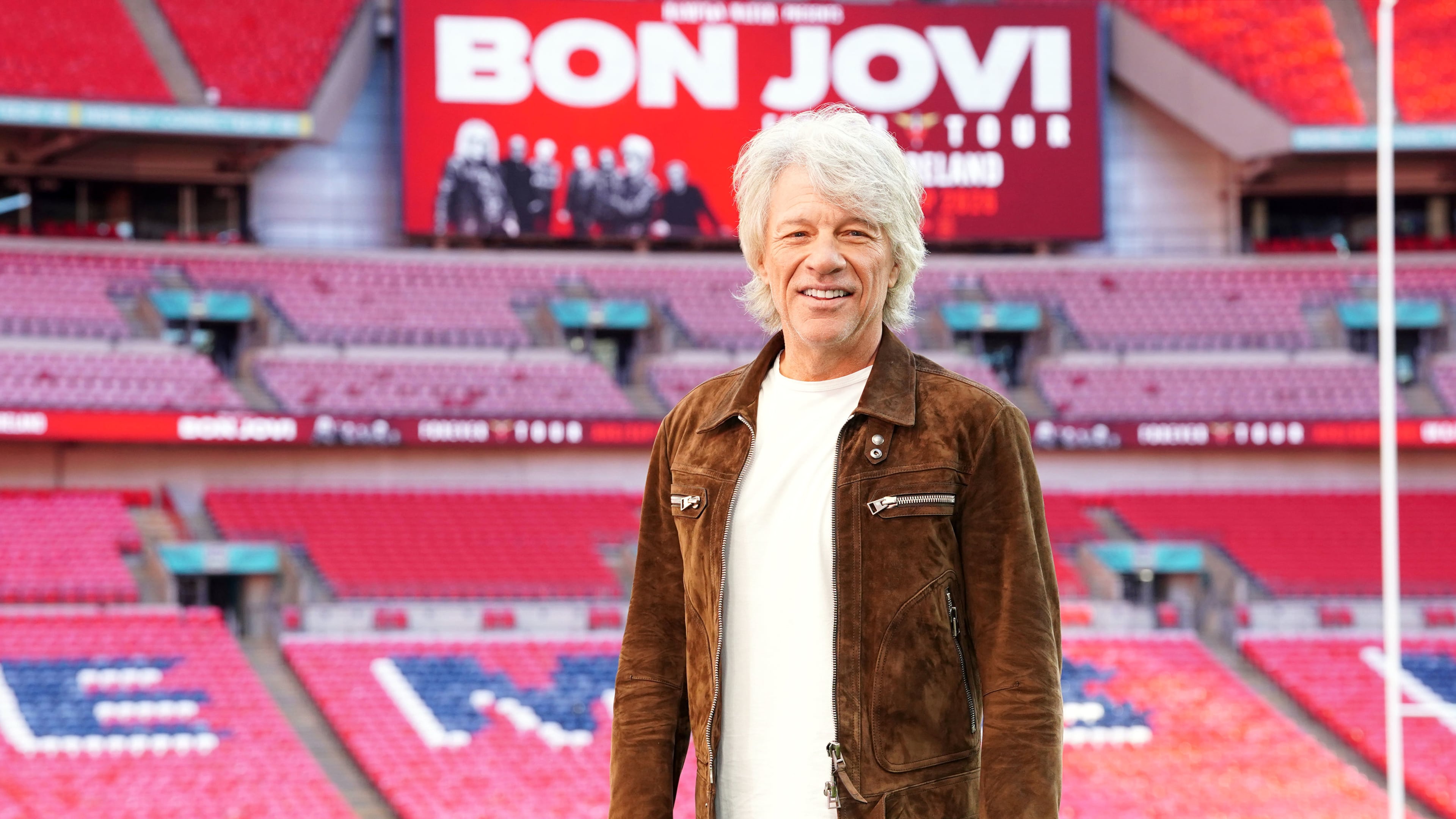 Singer Jon Bon Jovi poses for a photo at a press conference at Wembley Stadium to make an announcement and promote his new collaborations album, Forever, in north London, Friday, Oct. 24, 2025. (Ian West/PA via AP)