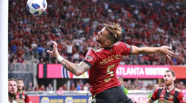Atlanta United defender Leandro Gonzalez Perez has his header bounce off the goal post just missing a goal against the Seattle Sounders during the second half in a MLS soccer match on Sunday, July 15, 2018, in Atlanta. Curtis Compton/ccompton@ajc.com