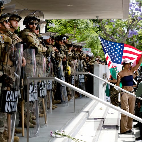 Protesters stand off against California National Guard soldiers at the Federal Building in downtown Los Angeles during a "No Kings" protest June 14, 2025. (Richard Voge/AP)