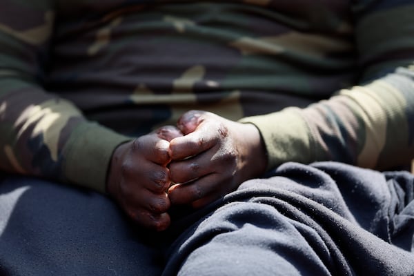 Rashaad Muhammad's fingers and lower legs were amputated after he went into septic shock while he was an inmate at Fulton County Jail. (Miguel Martinez/AJC)