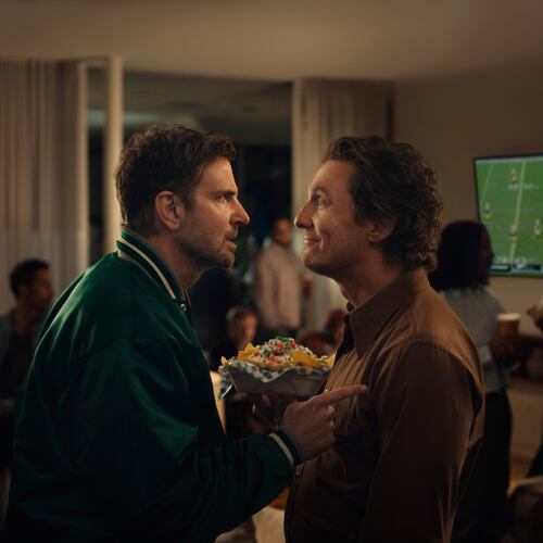 This undated image provided by Uber Eats shows Bradley Cooper, left, and Matthew McConaughey in a scene from the Uber Eats 2026 Super Bowl NFL football spot. (Uber Eats via AP)