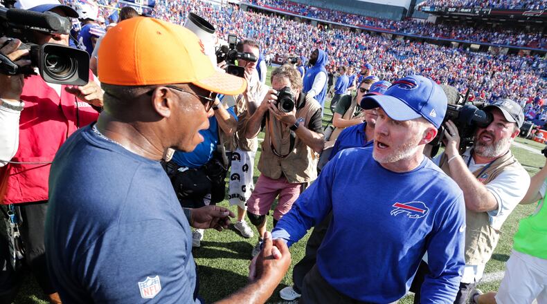 ORCHARD PARK, NY - SEPTEMBER 24: Head coach Vance Joseph of the Denver Broncos and head coach Sean McDermott of the Buffalo Bills greet at midfield after an NFL game on September 24, 2017 at New Era Field in Orchard Park, New York. (Photo by Brett Carlsen/Getty Images)