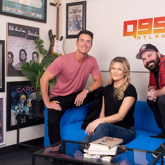 Joe Breezy, DK Kramer and Cory Freeman pose for a portrait at Q99.7 in Atlanta on Wednesday, March 25, 2026. Q99.7 is replacing The Bert Show of 25 years with a new trio. (Arvin Temkar/AJC)