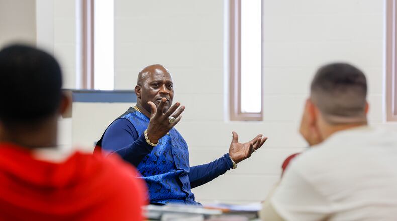 George Simmons speaks to a group of inmates going through a Washington County Jail diversion program that aims to teach them skills to keep them from offending again. Simmons, who served 10 years in a federal prison for a drug conviction, now helps inmates return to society, speaking about how to find jobs and restore their rights. (Miguel Martinez / AJC)