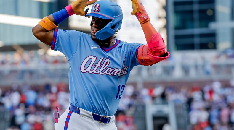 Atlanta Braves right fielder Ronald Acuña Jr. (13) reacts while rounding the bases after hitting a solo home run against the Arizona Diamondbacks during the first inning of a baseball game, Saturday, August 15, 2026, in Atlanta. (AP Photo/Erik S. Lesser)