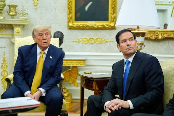 President Donald Trump and Secretary of State Marco Rubio listen during a meeting with Bahrain's Crown Prince Salman bin Hamad Al Khalifa in the Oval Office of the White House, Wednesday, July 16, 2025, in Washington. (AP Photo/Alex Brandon)