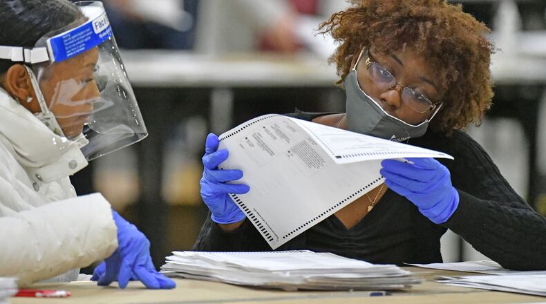 A judge's decision to unseal absentee ballots in Fulton County paves the way for another review of the presidential election in Georgia. (File photo by Hyosub Shin/Atlanta Journal-Constitution)