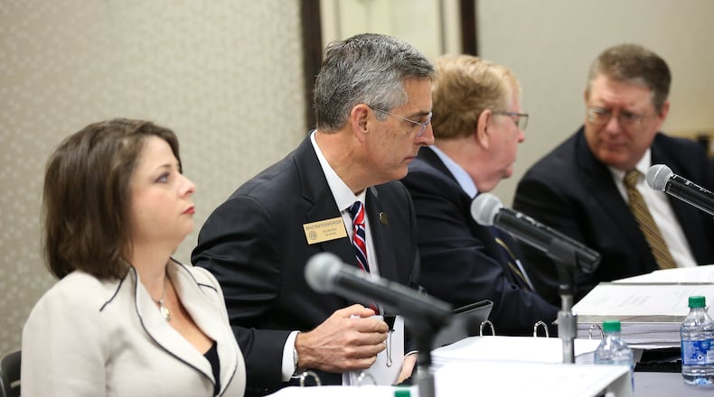 State Election Board members prepare for an emergency hearing at the Georgia Center for Continuing Education in Athens, Ga., on Wednesday, March 11, 2020. The hearing will decide whether Athens election officials broke state laws when they switched to paper ballots filled out by hand. [Photo/Austin Steele for the Atlanta Journal Constitution)