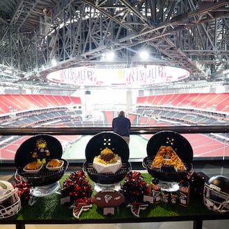 Multiple food options will be available for the upcoming Falcons games, like the Dirty Bird Dusted Wings, Freddie Burgers and, for a limited time, the Stadium Rack-O-Ribs. (Miguel Martinez/AJC)